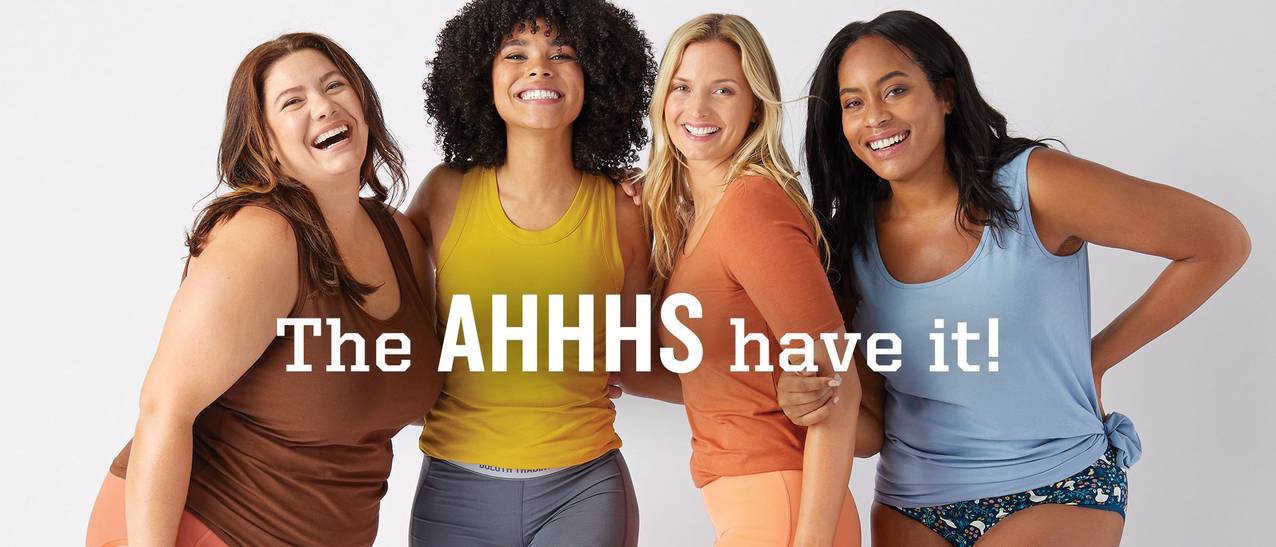 Four women standing next to each other smiling while wearing Duluth Trading Underwear