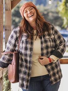 woman in a free swingin' flannel shirt