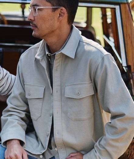 Man wearing tan button down.