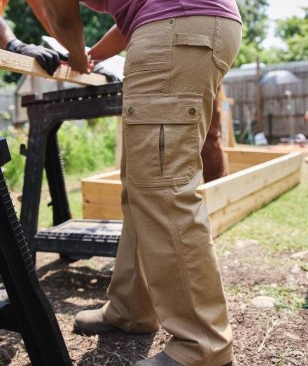Woman wearing khaki work pants.