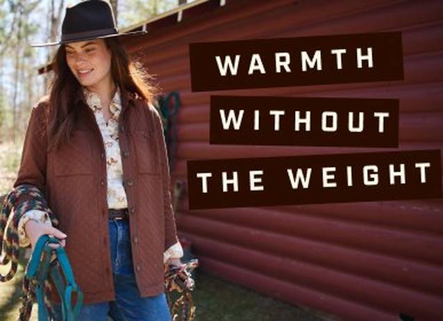 Woman wearing burnt orange button down.