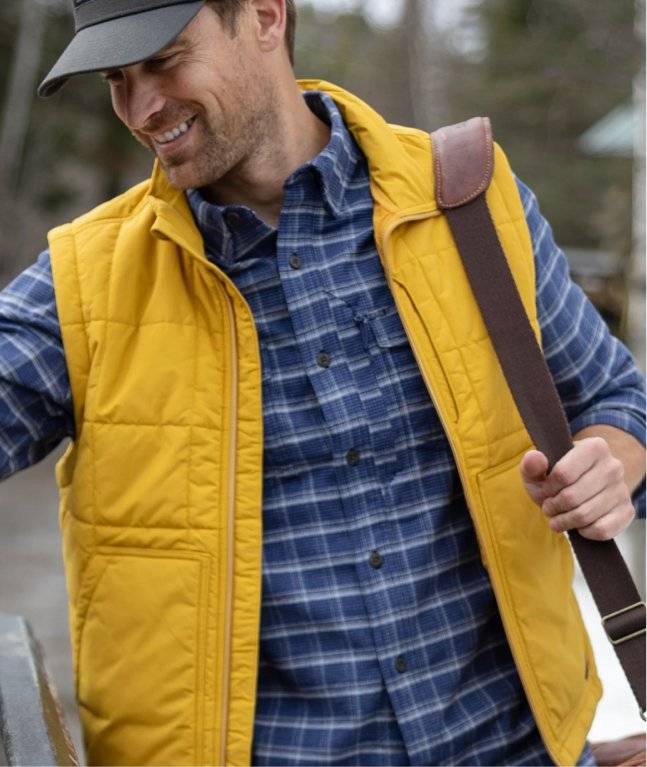 Man wearing yellow vest.