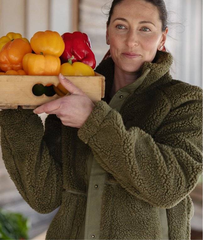 Woman wearing a green fleece jacket