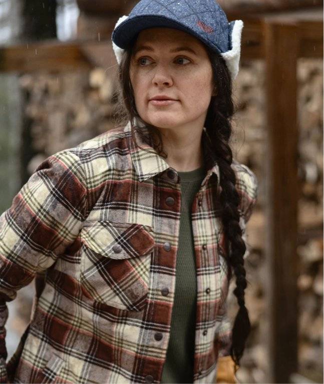 Woman wearing a flannel jacket