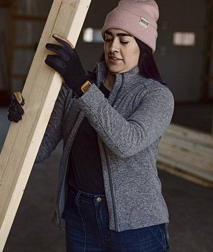 A woman in a gray fleece jacket