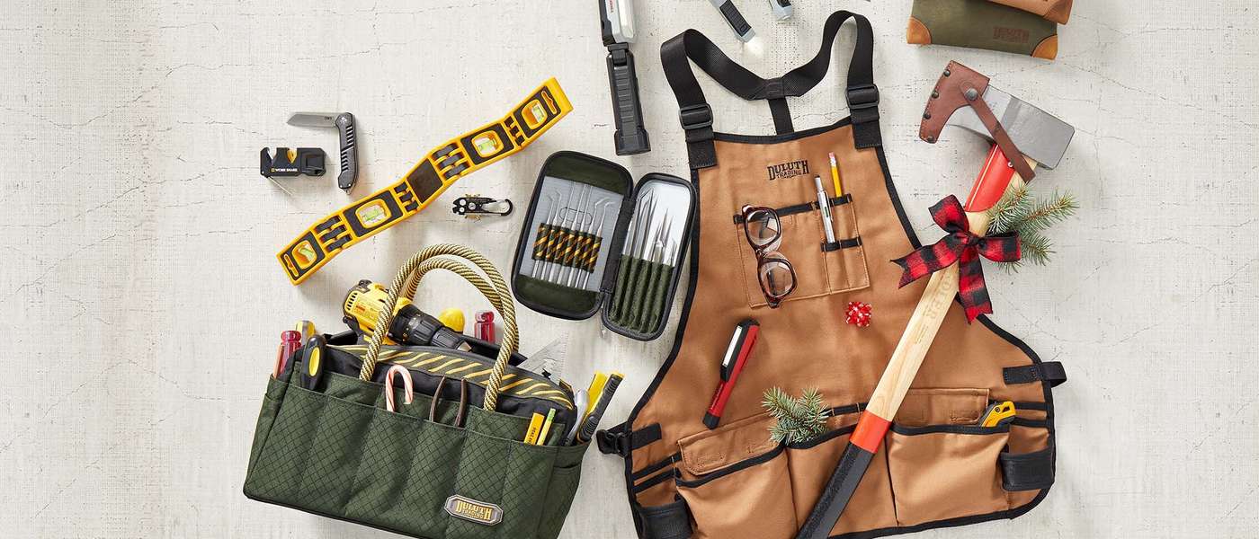 A collection of Duluth tools, toolbags, aprons and other assorted items