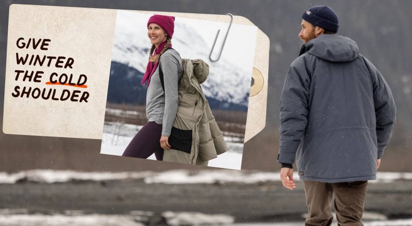 Man and woman wearing winter jackets.