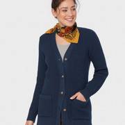 Woman wearing a navy blue cardigan.