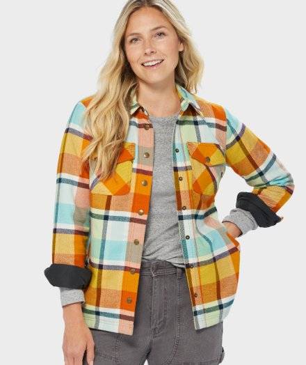  Woman wearing a flannel shirt jac.