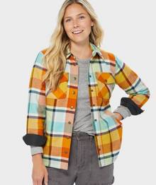  Woman wearing a flannel shirt jac.