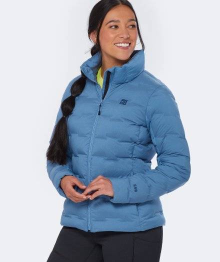 Woman wearing a blue puffer jacket.