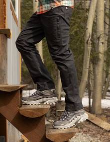 Man wearing grey pants.