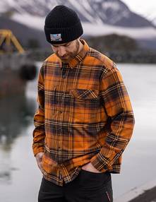 Man wearing an orange flannel.