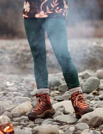 Woman wearing green leggings.