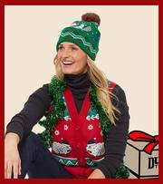 Woman wearing a holiday patterned sweater vest.