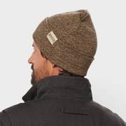 Man wearing a brown fold over beanie.