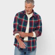 Man wearing a flannel shirt.