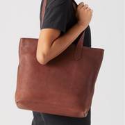 Brown leather tote bag.