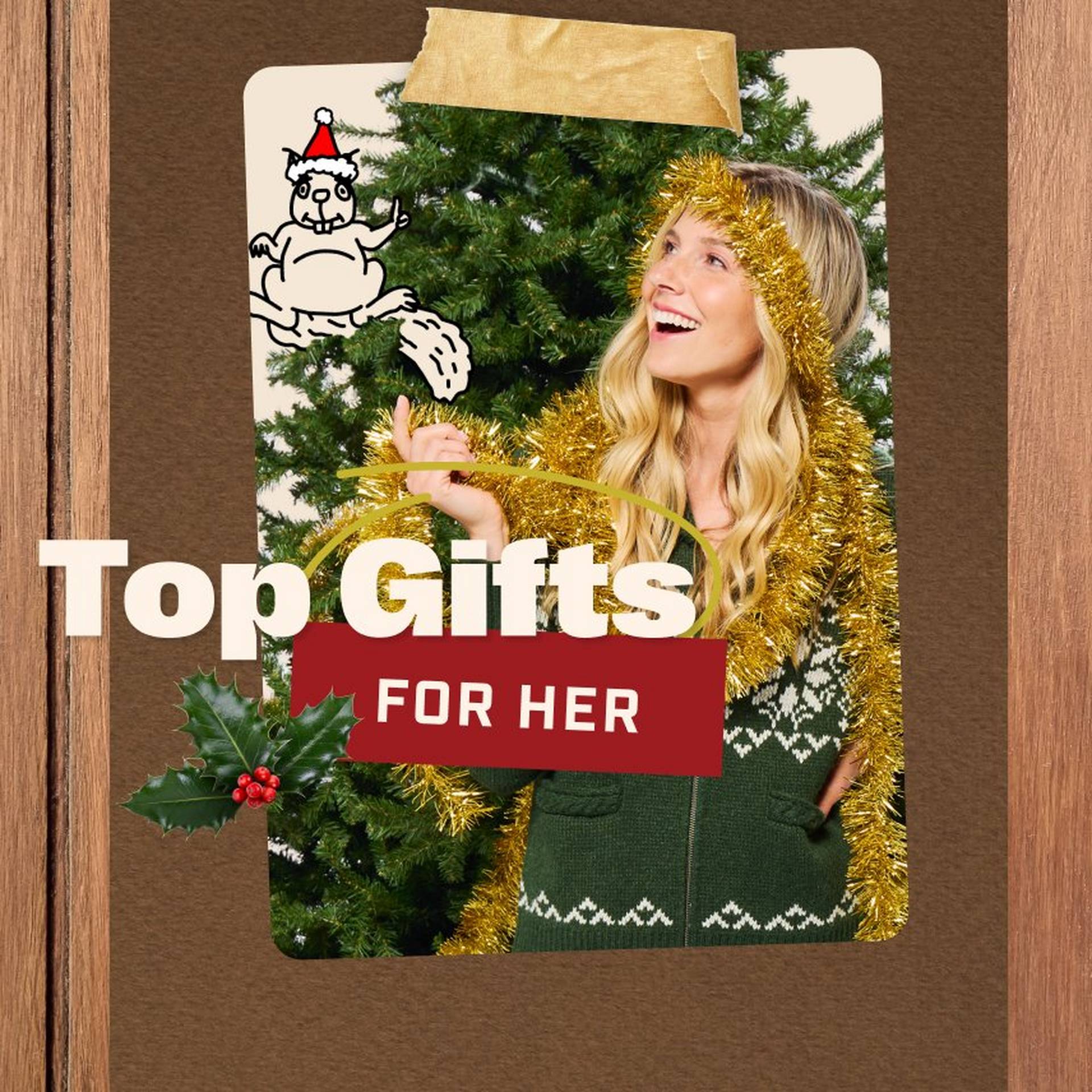 Woman standing in front of a Christmas tree.