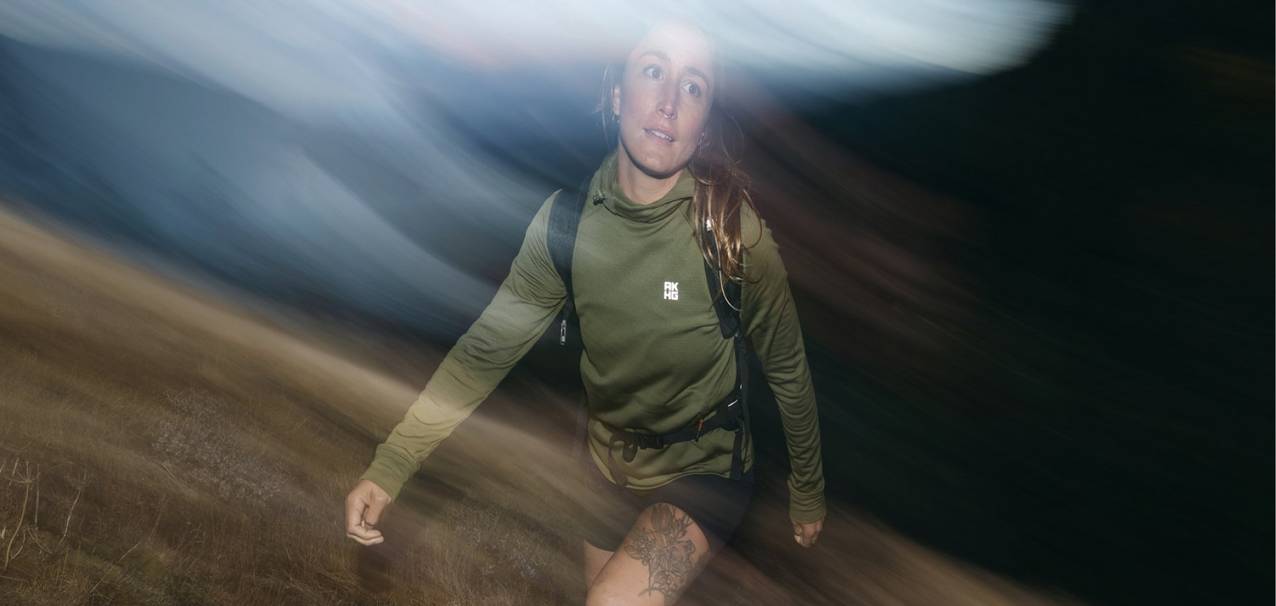 Woman hiking at night