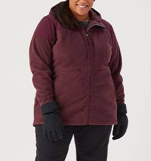 woman wearing a burgundy jacket