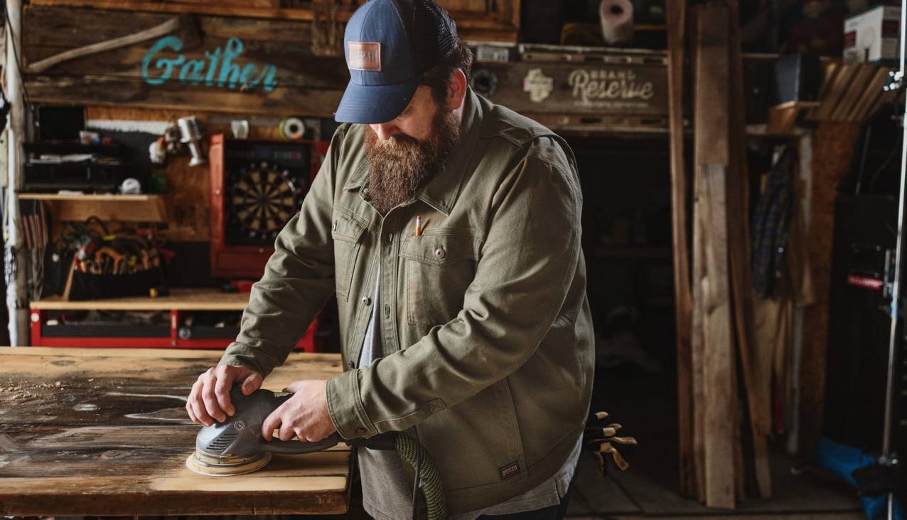 Man sanding wood