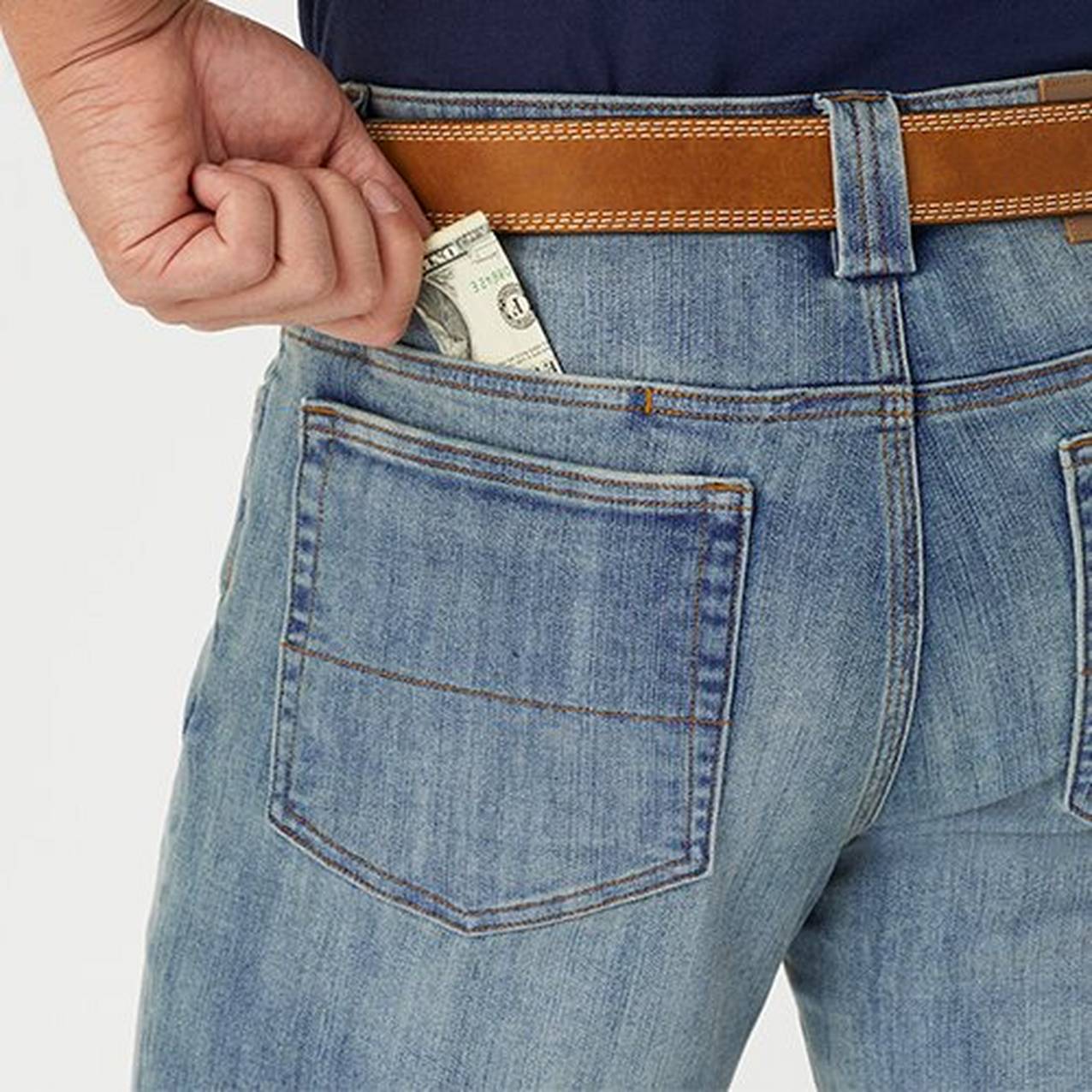 Image of man putting money in hidden pocket
