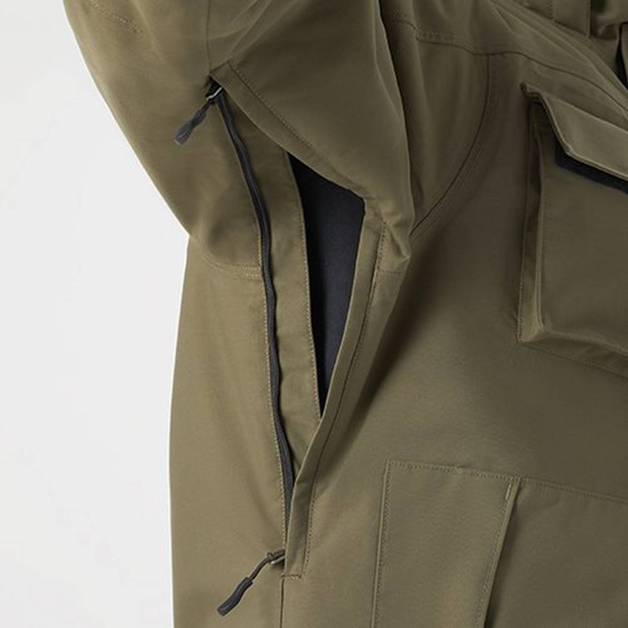 Close up of a zippered opening in the underarm of a jacket