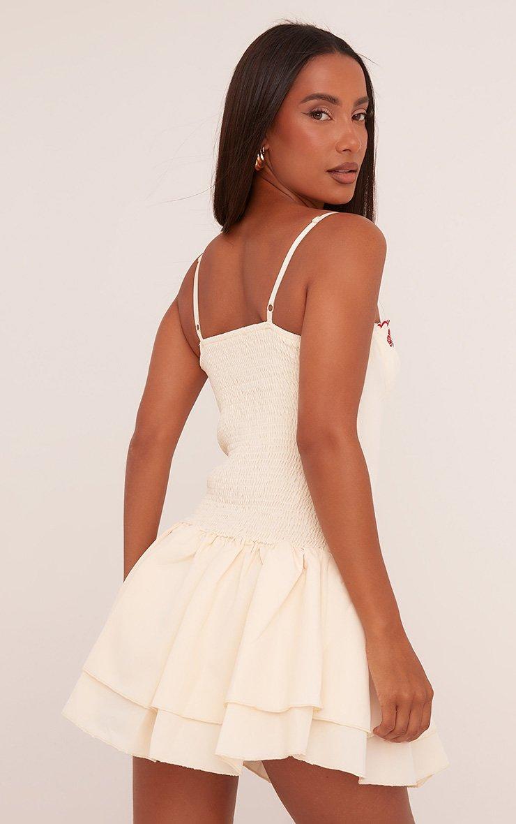 Strappy Flower Embroidered Detail Corseted Flippy Hem Mini Dress