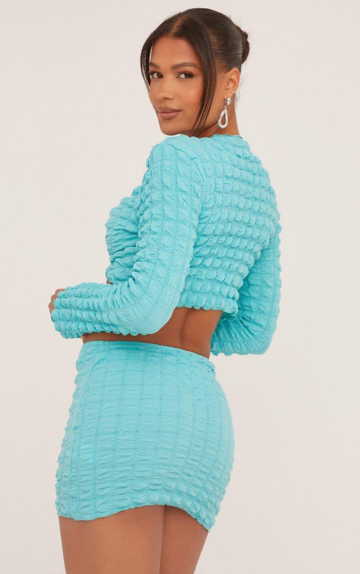 Long Sleeve Keyhole Cut Out Crop Top In Blue Bubble Texture