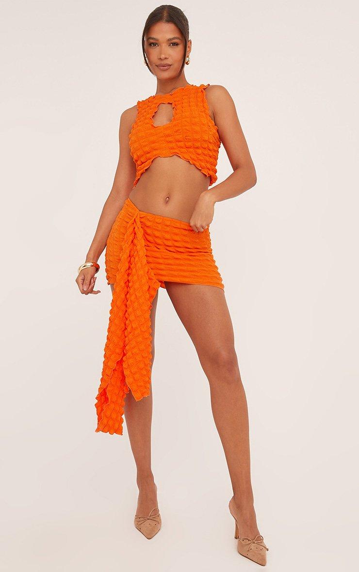 Low Rise Drape Front Mini Skirt In Orange Bubble Texture | EGO US
