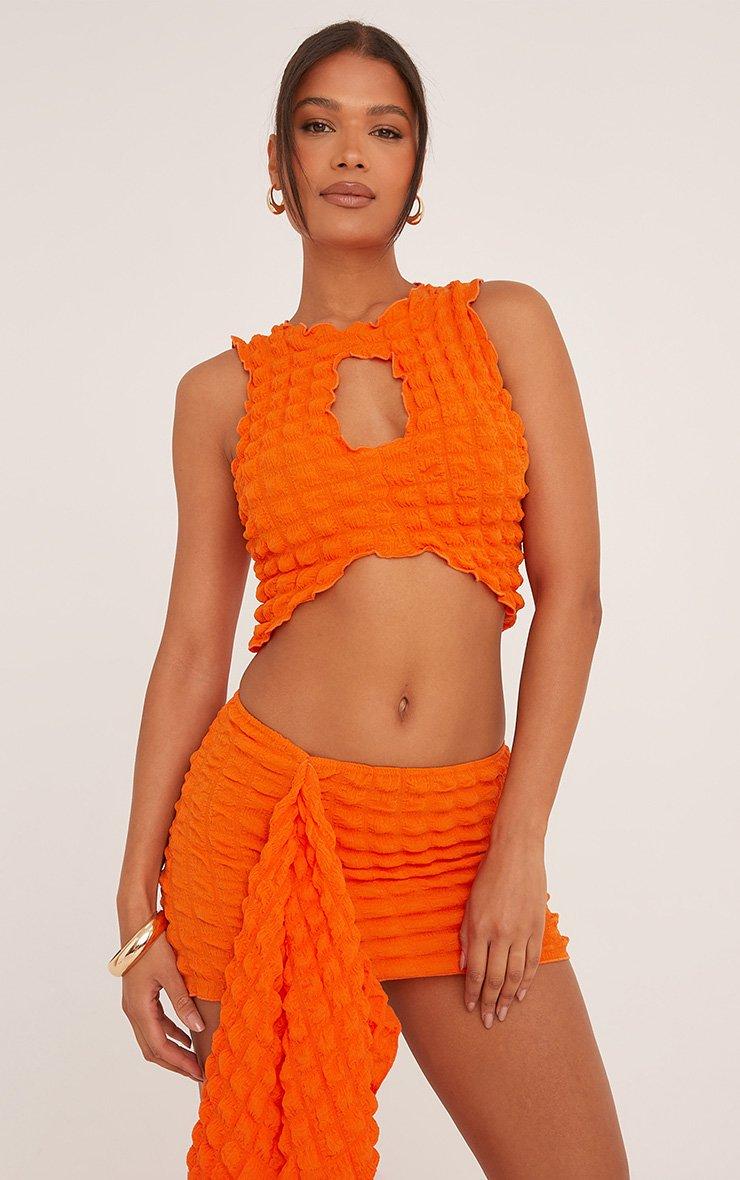 Low Rise Drape Front Mini Skirt In Orange Bubble Texture | EGO US