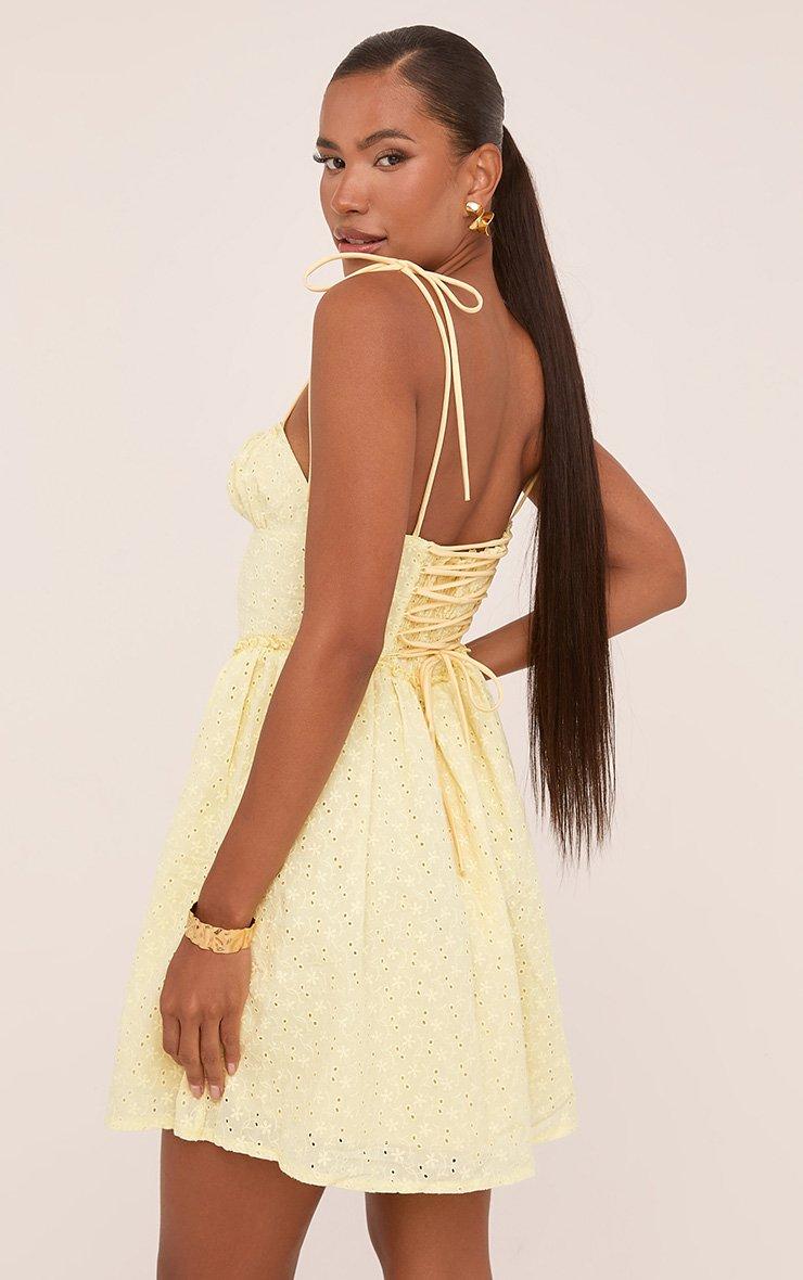 Strappy Tie Front Corseted Skater Mini Broderie Dress In Yellow | EGO US |  EGO