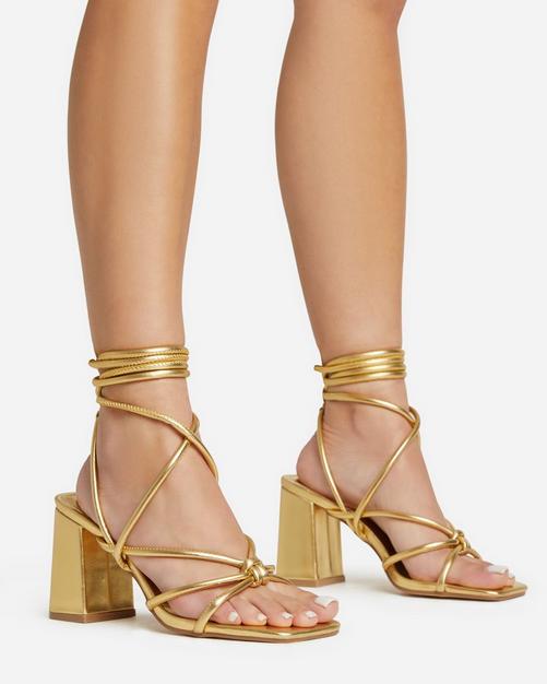 Gold tie up block on sale heels