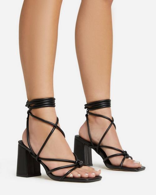 Black heels with store strings