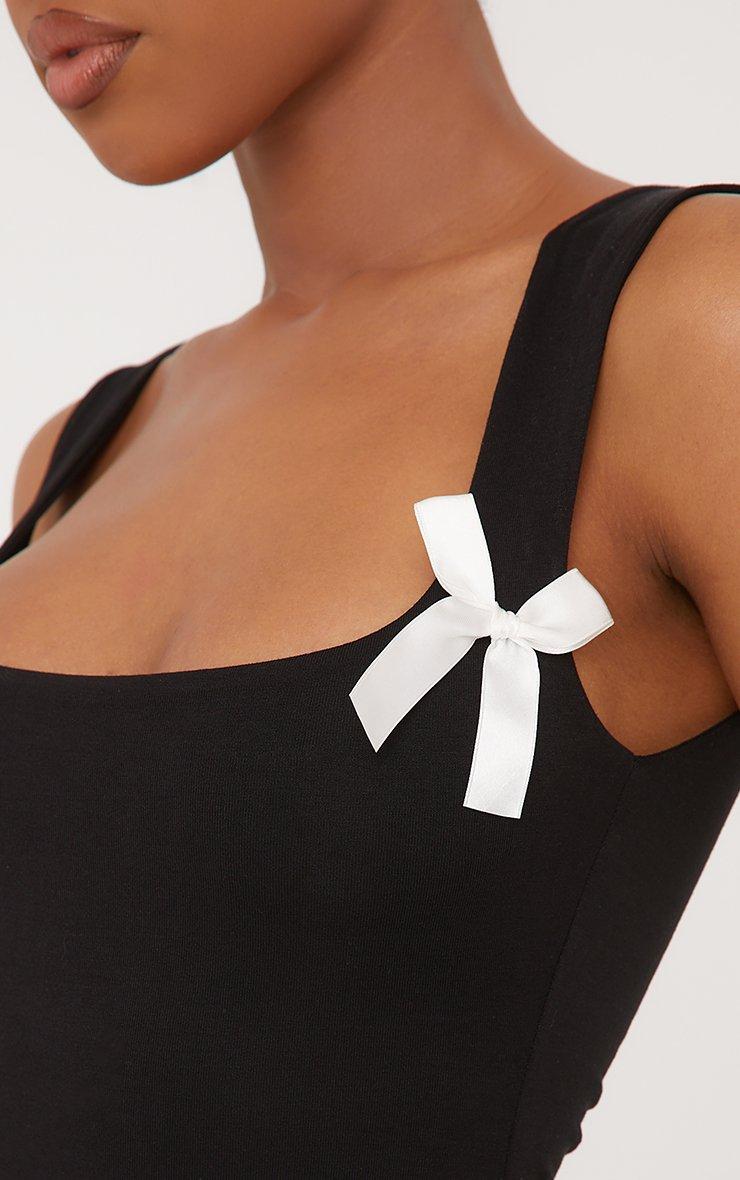 Contrast Bow Detail Mini Bodycon Dress In Black | EGO AE