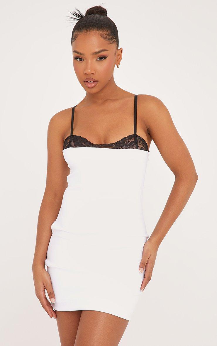 white dress with black trim Long Accents Around the Waist 49.5 (Size 1X) Behind The Light Lace Mini