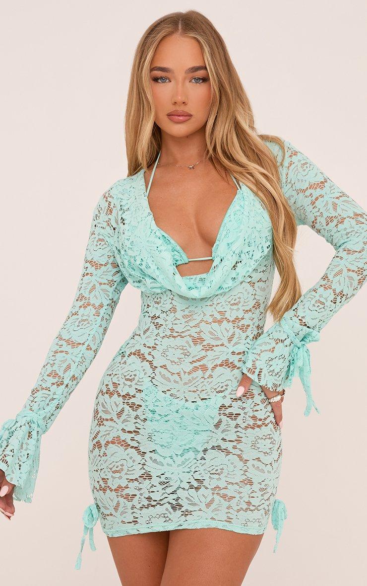 lace dress with flared sleeves 66325: Allover Fit and Flare Plunging V-Neck and Bell This Bell Sleeve Lace Dress is made from a luxurious and timeless fabric with a mini silhouette Alexander by Daymor 1555 Bell