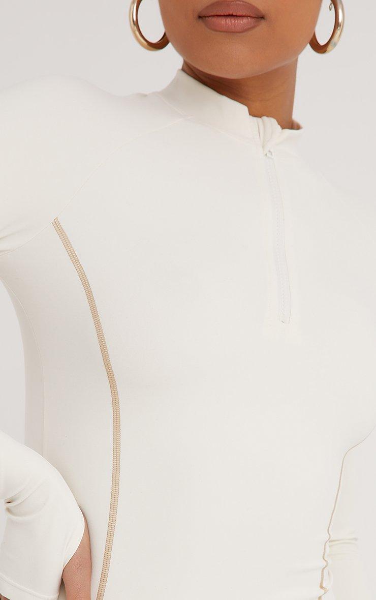 Long Sleeve Sculpt Seam Detail Zip Up Front Mini Bodycon Dress In Cream  Slinky | EGO US | EGO