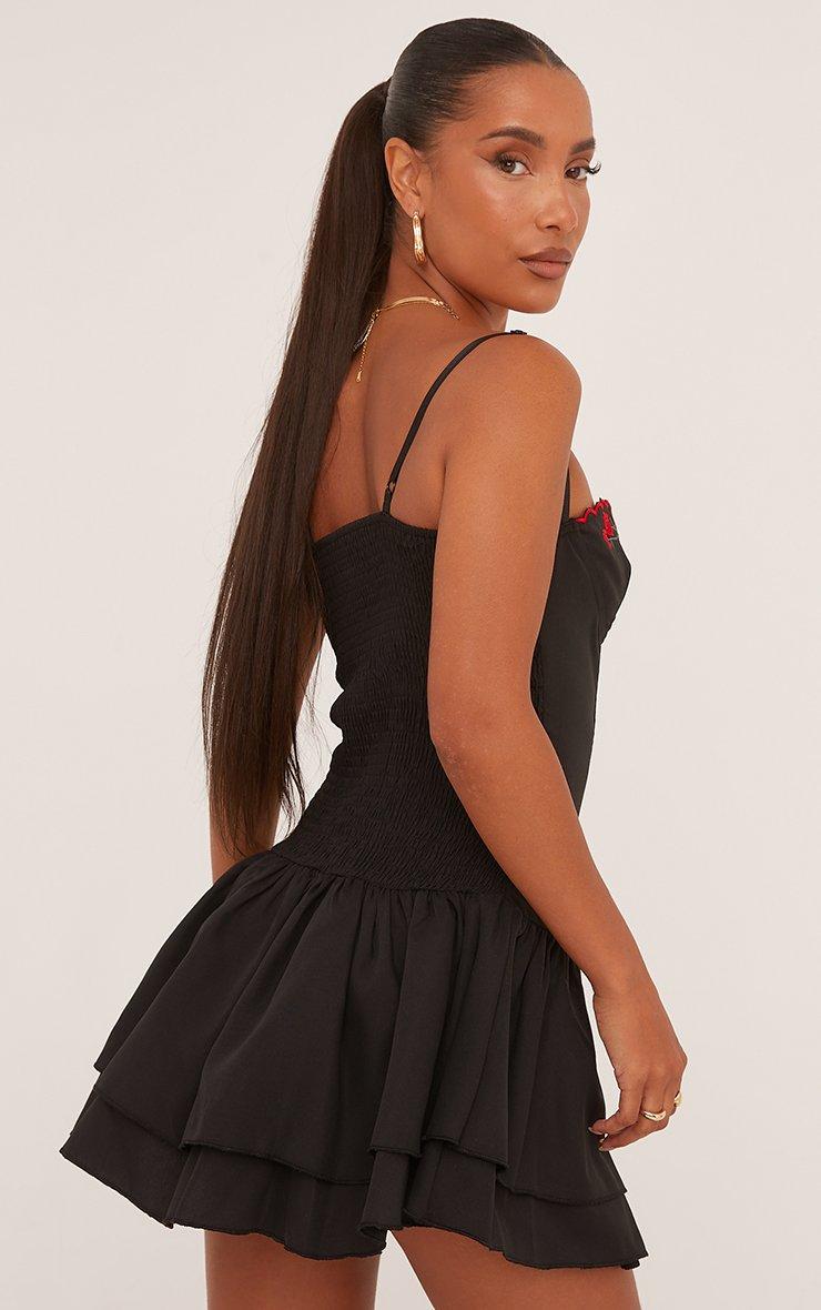 Strappy Flower Embroidered Detail Corseted Flippy Hem Mini Dress