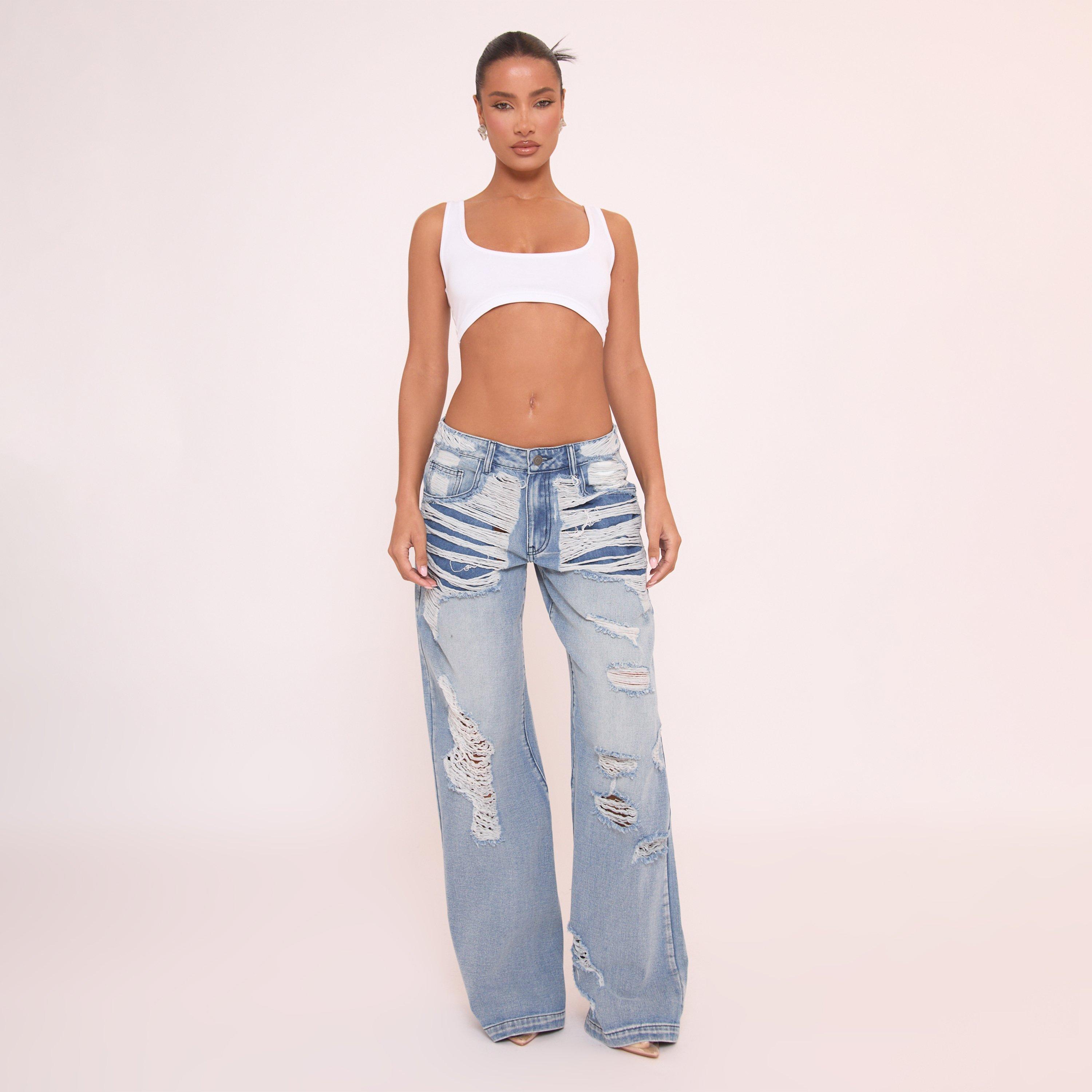 Image of Extreme Low Rise Distressed Hem Detail Boyfriend Jeans In Blue Denim, Women's