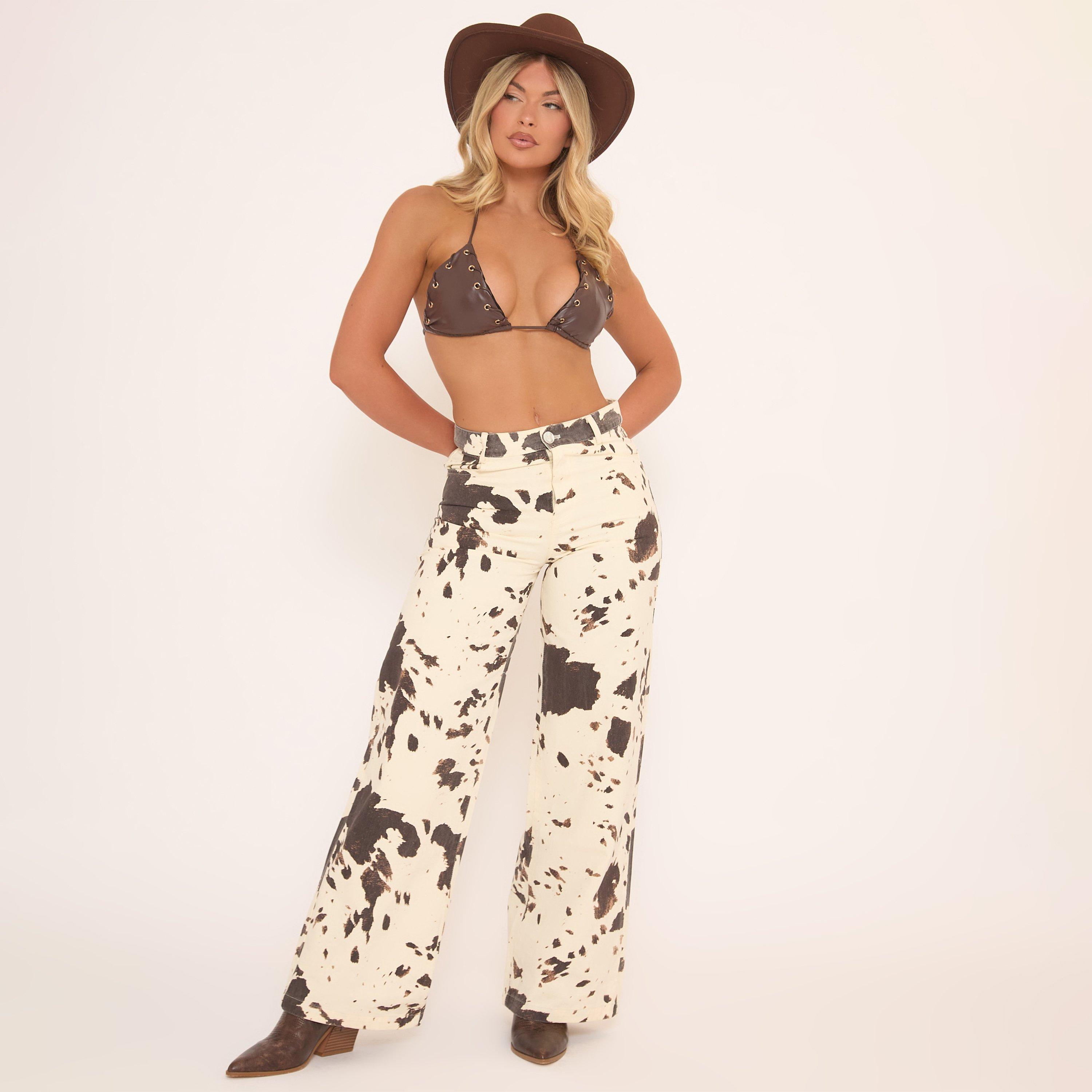 Image of Mid Rise Jeans In White Cow Print Denim, Women's Size UK L