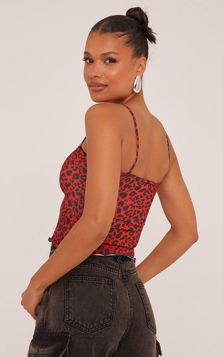 Mini abito-camicia con bottoni e maniche lunghe con stampa