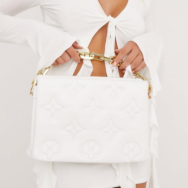 Linden Embossed Detail Oversized Clutch Bag In Cream Faux Leather