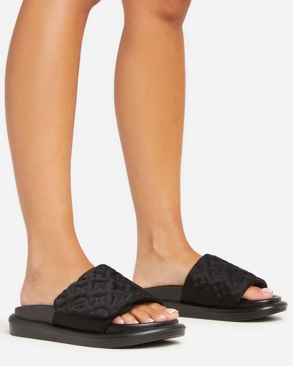 It s A Vibe Embossed Velcro Strap Flat Slider Sandal In Black