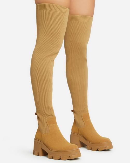 Tan thigh high hot sale flat boots