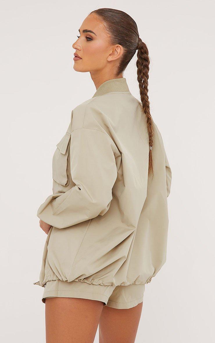 High Neck Pocket Detail Oversized Bomber Jacket In Khaki High Neck Pocket Detail Oversized Bomber Jacket In Khaki