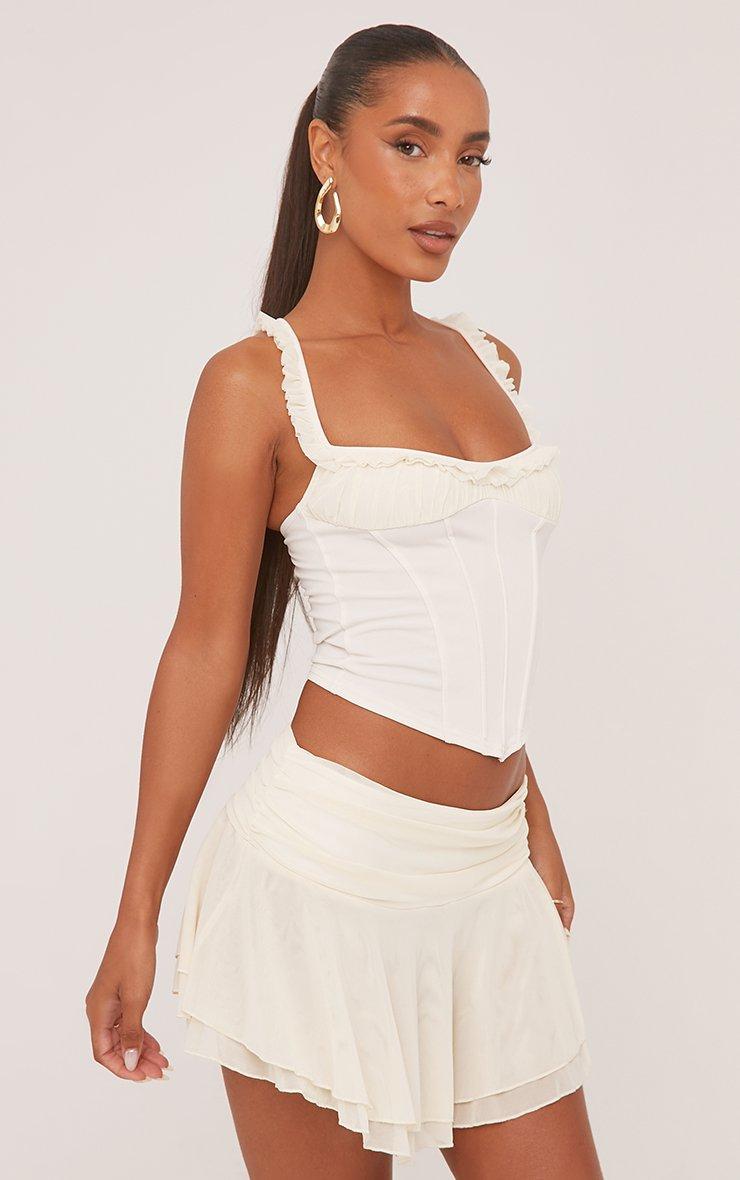 Frill Trim Corset Top And Flippy Hem Mini Skirt Co-Ord Set In