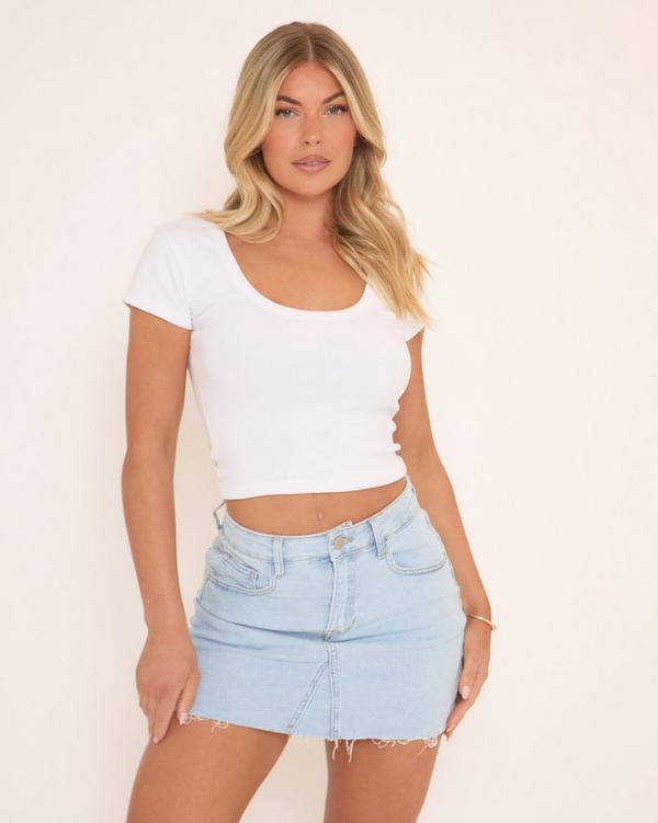 Mid Rise Frayed Hem Mini Skirt In Blue Denim