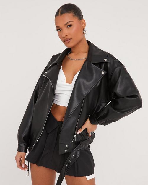 Women's Black Leather Biker Jacket, Black V-neck T-shirt, Grey Tapered Pants,  White Leather Low Top Sneakers